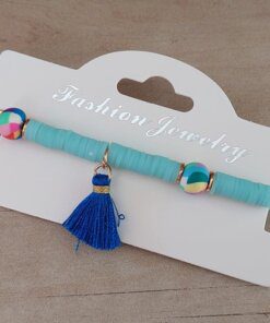 PULSERA ELASTIZADA FIMO DISCO CELESTE CON POMPÓN AZUL