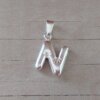 DIJE DE ACERO BLANCO INICIAL GLOBO DE 15 X 19 MM