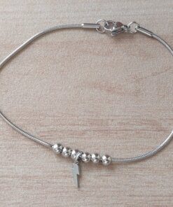 PULSERA DE ACERO COLA DE RATÓN CON BOLITAS Y DIJE RAYO. LARGO 18,5 CM
