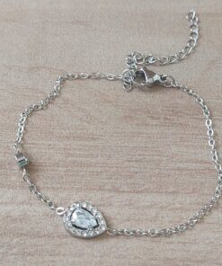 PULSERA DE ACERO ESPEJITO CON CENTRO CUBIK LAGRIMA CON STRASS ALREDEDOR Y SUSANITO. LARGO 15,5 CM + EST. DE 4 CM