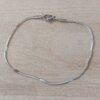 PULSERA DE ACERO COLA DE RATÓN 1.2 MM CON CON INTERVALOS PLANOS. LARGO 19 CM