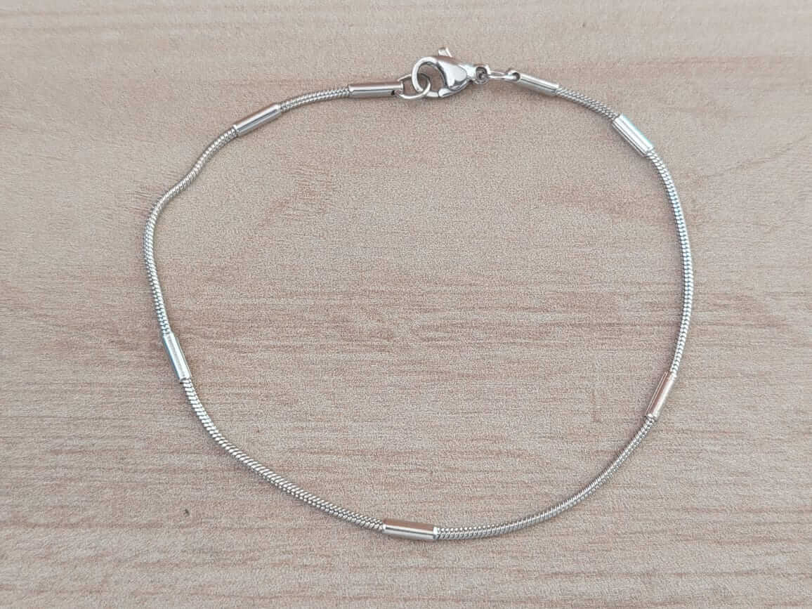 PULSERA DE ACERO COLA DE RATÓN 1.2 MM CON TUBOS. LARGO 19,5 CM