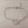 PULSERA DE ACERO ESLABÓN ESPEJITO DOBLE CON CENTRO CORAZÓN CALADO CON OJO VERDE. LARGO 17,5 + 2,5 CM EXT.