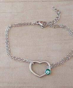 PULSERA DE ACERO ESLABÓN ESPEJITO DOBLE CON CENTRO CORAZÓN CALADO CON OJO VERDE. LARGO 17,5 + 2,5 CM EXT.