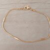 PULSERA DE ACERO DORADO COLA DE RATÓN 1.2 MM CON TUBOS. LARGO 19,5 CM