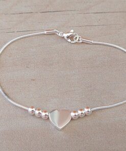 PULSERA DE ACERO BLANCO COLA DE RATÓN CON BOLITAS Y CORAZÓN PASANTE. LARGO 19 .