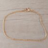 PULSERA DE ACERO DORADO COLA DE RATÓN 1.2 CON BOLITAS 1 MM. LARGO 18 CM