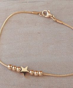 PULSERA DE ACERO DORADO ESLABÓN COLA DE RATÓN CON BOLITAS DE 3 MM Y ESTRELLA CENTRAL. LARGO 18,5 CM
