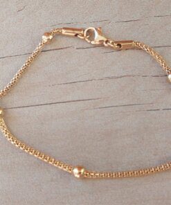 PULSERA DE ACERO DORADA MALLA TUBULAR CON BOLITAS 3 MM. LARGO 19 CM.