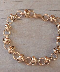 PULSERA DE ACERO DORADO ESLABÓN ROLO CONECTADO CON ARGOLLA. LARGO 18,5 CM