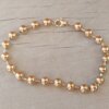 PULSERA DE ACERO DORADO ESLABÓN BOLITAS 5 MM. LARGO 19,5 CM