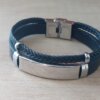 PULSERA DE CAUCHO COMBINADA PLANA Y TRENZA CON CENTRO EN ACERO APTO PARA GRABAR. LARGO 20 CM.