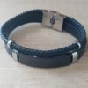 PULSERA DE CAUCHO COMBINADA PLANA Y TRENZA CON CENTRO EN ACERO NEGRO APTO PARA GRABAR. LARGO 20 CM.