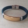 PULSERA DE CAUCHO CON CENTRO EN ACERO DORADO APTO PARA GRABAR. LARGO 20 CM.