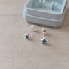ABRIDOR PLATA ESTRELLA MINI CON STRASS CELESTE