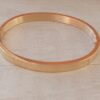 PULSERA DE ACERO DORADO ESCLAVA OVALADA CON BISAGRA 6 MM.
