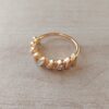 ANILLO DE ACERO DORADO TIPO CHUNKY OVALOS DIAGONALES CON STRASS