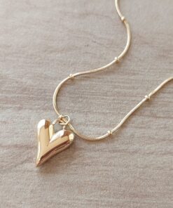 COLGANTE DE ACERO DORADO ESLABÓN COLA DE RATÓN CON BOLITAS Y DIJE CORAZÓN ALARGADO. LARGO 40 CM + 5 CM EXT