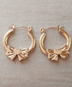 ARO DE ACERO DORADO ARGOLLA 3 MM HUECA CON MOÑO. MEDIDAS 22 X 24 MM