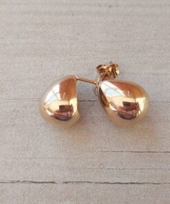 ARO DE ACERO DORADO FORMA GOTA BOMBÉ. TAMAÑO 10 X 15 MM