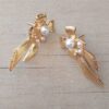 ARO DE ACERO DORADO MOÑO CON PERLAS. MEDIDA 18 X 40 MM