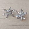 ARO DE ACERO FORMA FLOR. TAMAÑO 25 X 30 MM