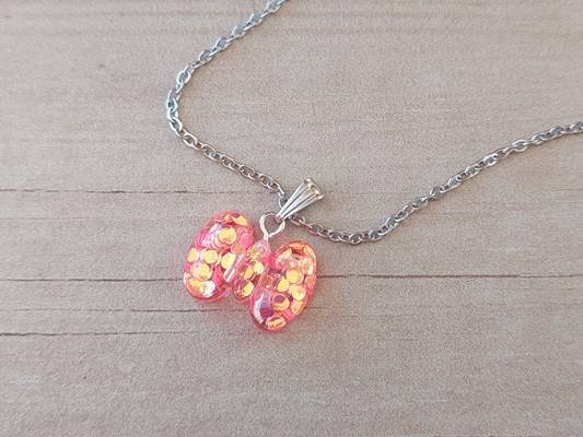 COLGANTE CADENA DE ACERO ESPEJITO CON DIJE MOÑO CORAL TAMAÑO 17 X 14 MM. LARGO 45 CM