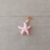 DIJE DE ACERO DORADO ESTRELLA MAR PIEDRA RECONSTITUIDA ROSA. MEDIDAS 15 MM