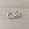ARO DE ACERO DORADO ARGOLLA 1.5 MM CON BISAGRA Y FRENTE DE STRASS BLANCO. DIÁMETRO 10 MM