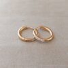 ARO DE ACERO DORADO ARGOLLA 1.5 MM CON BISAGRA Y FRENTE DE STRASS BLANCO. DIÁMETRO 12 MM