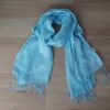 PASHMINA LISA CELESTE TRAMA FLORES CON FLECOS 70 X 180 CM.