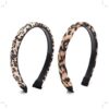Vincha rigida estampada animal print x 12 unid.
