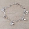 PULSERA DE ACERO ESLABÓN TIFFANY CON BOLITAS Y DIJES DE UNICORNIOS. LARGO 19 CM