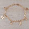 PULSERA DE ACERO DORADO ESLABÓN TIFFANY CON ESTRELLAS CALADAS Y BOLITAS COLGANTES. LARGO 19 CM