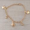 PULSERA DE ACERO DORADO ESLABÓN TIFFANY CON CRUZ DEL EQUILIBRIO Y BOLITAS COLGANTES. LARGO 19 CM
