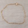 PULSERA DE ACERO DORADO SINGAPUR CON BOLITAS. LARGO 19 CM
