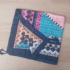 PAREO ESTAMPADO CON BORLAS 80 X 180 CM.