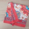 PAREO ESTAMPADO CON BORLAS 80 X 180 CM.