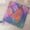 PAREO ESTAMPADO CON BORLAS 80 X 180 CM.