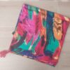 PAREO ESTAMPADO CON BORLAS 80 X 180 CM.