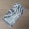 PAÑUELO RASADO ESTAMPADO ANIMAL PRINT NEGRO. 90 X 90 CM