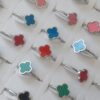 ANILLOS DE ACERO VAN CLEEF ESMALTADO X 36 UNIDADES.(MEDIDAS DEL 16 AL 20)