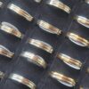 ANILLOS DE ACERO ALIANZAS COMBINADO IRREGULARMENTE CON DORADO X 36 UNIDADES SURTIDOS EN MEDIDAS. (MEDIDAS DEL 16 AL 20)