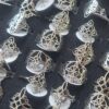 ANILLOS FIGURA CALADA DE ACERO (NUDO DE BRUJAS) X 36 UNIDADES SURTIDOS EN MEDIDAS Y MODELOS. MEDIDA DEL 16 AL 20.