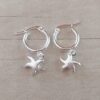 ARO DE ACERO BLANCO ARGOLLA 15 MM CON DIJE ESTRELLA DE MAR HUECO.