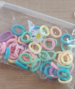 COLITAS MINI COLOR PASTEL. TAMAÑO 2.0. BOLSA X 50 UNIDADES APROX.