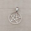 DIJE DE ACERO CIRCULO CON ESTRELLA CALADA. 25 MM