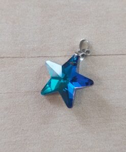 DIJE DE ACERO ESTRELLA 20 MM DE ACRÍLICO COLOR TURQUESA. 20 MM