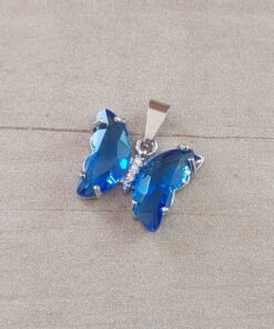 DIJE DE ACERO MARIPOSA DE ACRÍLICO CRISTAL AZUL. 15 X 20 MM