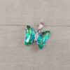 DIJE DE ACERO MARIPOSA DE ACRÍLICO VERDE TORNASOL. 15 X 20 MM